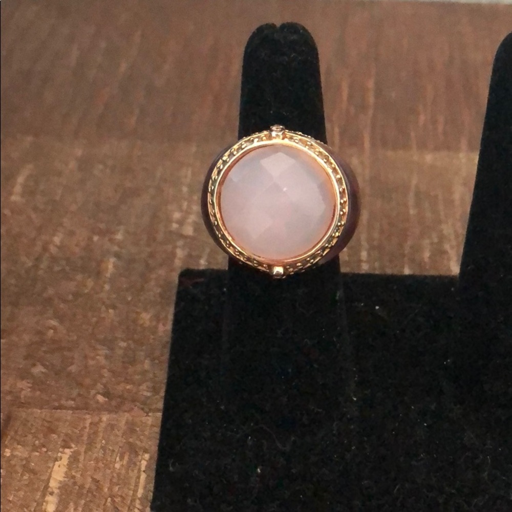 Ring with pink stone purple inlay